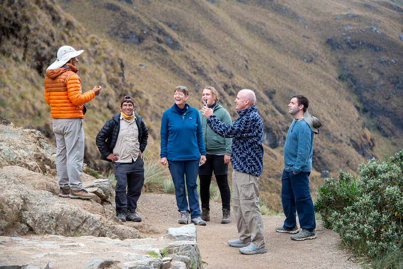 Professional local guide explaining ancient Incan history