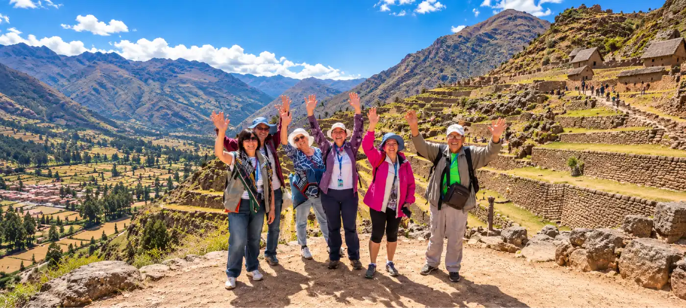 Group of travelers enjoying the terraces and landscapes of the Sacred Valley, Cusco